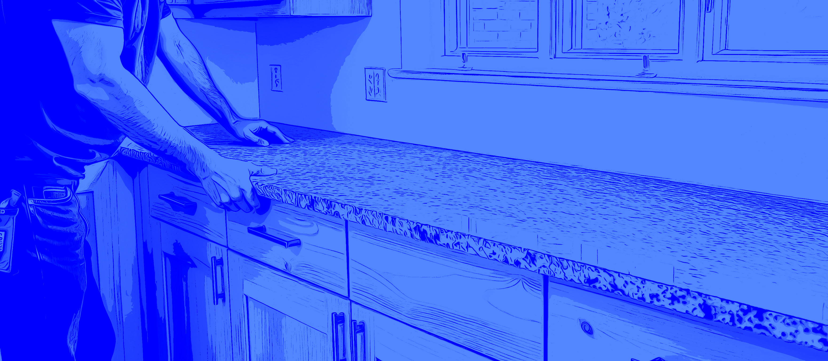 Professional stone countertop installation crew working on granite slab in Saint Louis area home